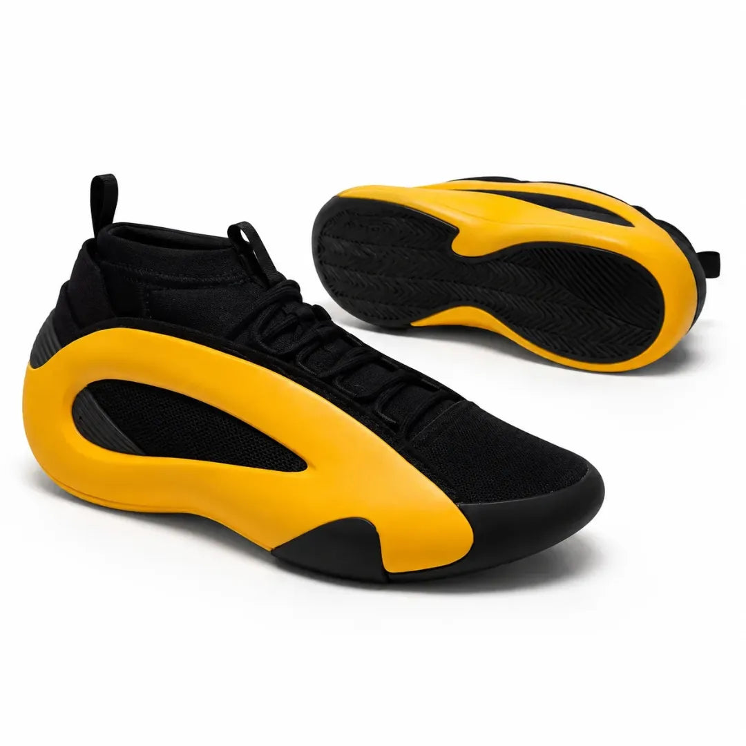 A pair of black and bright yellow athletic sneakers shown on a clean white background, with one shoe displaying the side profile and the other showing the sole.