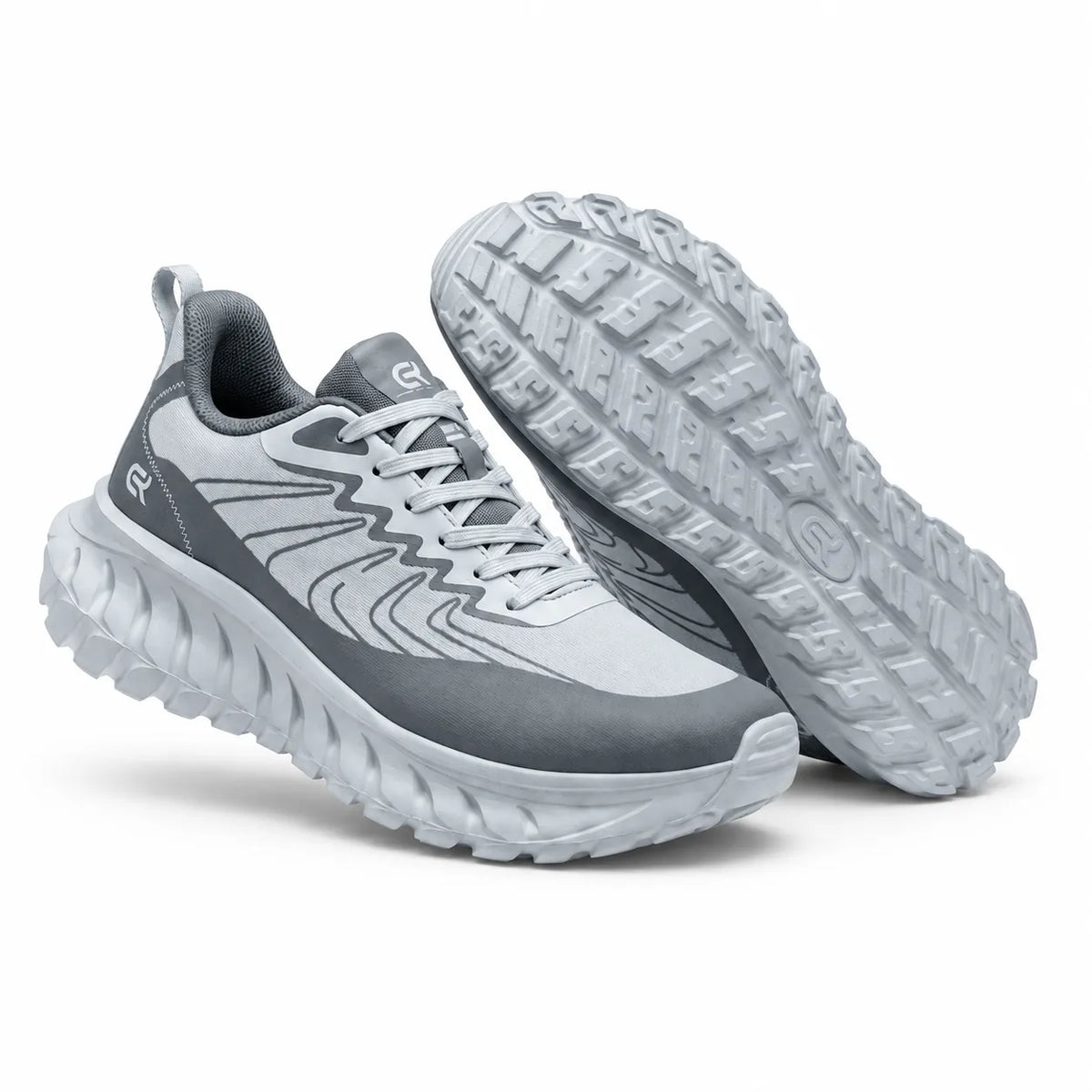 A pair of gray and white athletic trail running shoes, with one shoe shown from the side profile and the other from the bottom sole view, on a clean white background.