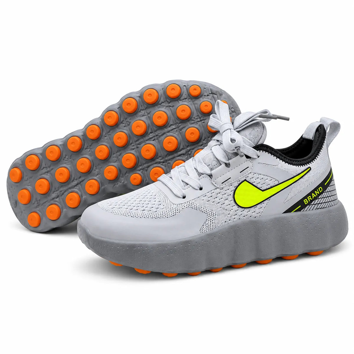 A pair of Nike running shoes in light gray with bright neon yellow-green Swoosh branding and orange lugs on the sole, shown on a clean white background.