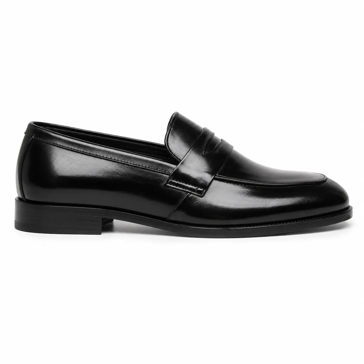 A single black leather penny loafer shoe shown in a side 