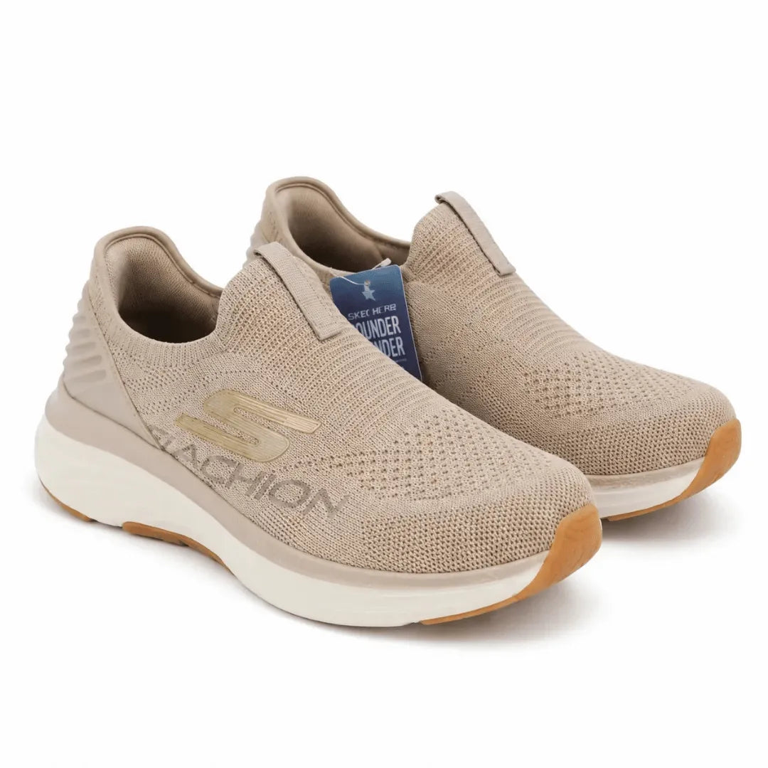 Pair of gray sneakers on a light gray background
