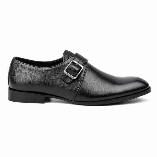 Black leather dress shoe on a white background