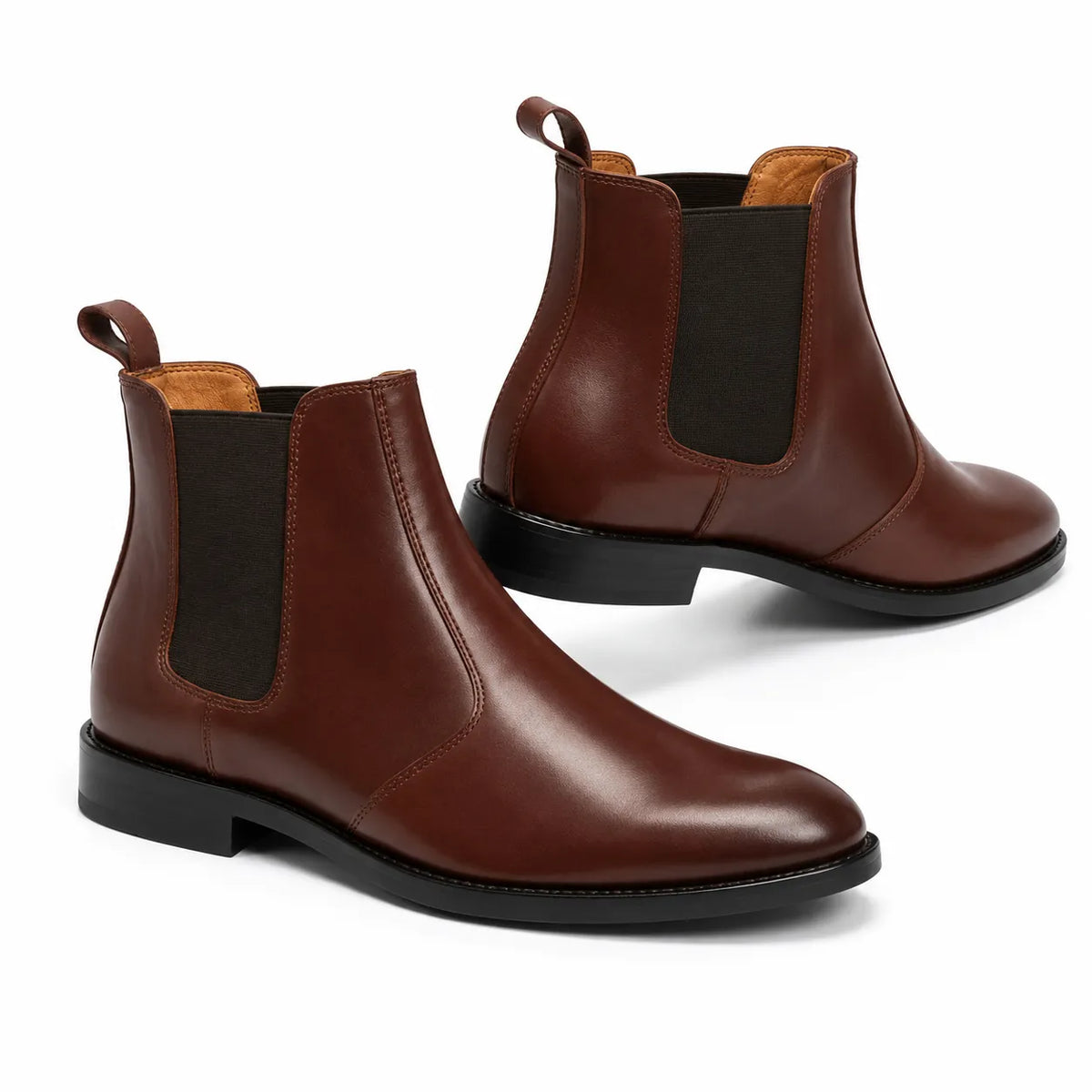 Classic brown leather Chelsea dress boots with elastic gussets and a polished finish on a white background.