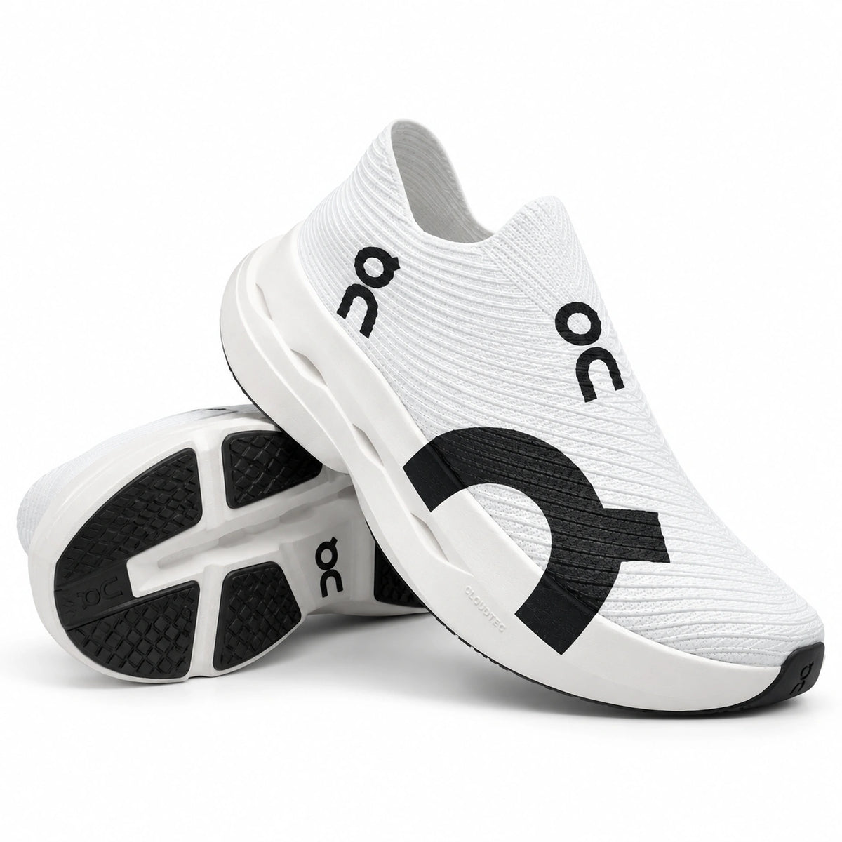 Cloud Boom Strike White Duo lightweight slip-on running shoes with breathable knit upper, black signature detailing, and cushioned CloudTec sole