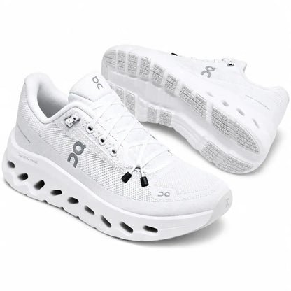 A pair of white On running shoes with gray logo accents and black laces, displayed on a clean white background.