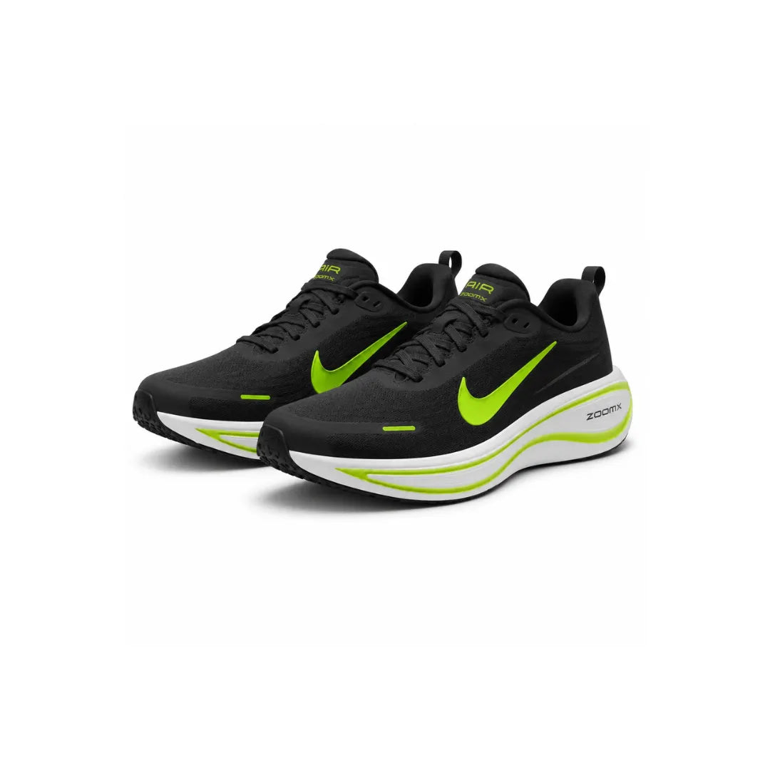 A pair of Puma running shoes in a vibrant neon yellow-green colorway, featuring black Puma cat logos and the Formstrip design on a clean white background.