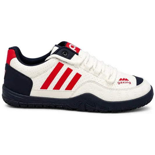 A low-top sneaker in white leather with three bold red stripes on the side, a red heel tab, a navy blue outsole, and a red 'gazing' logo on the side.