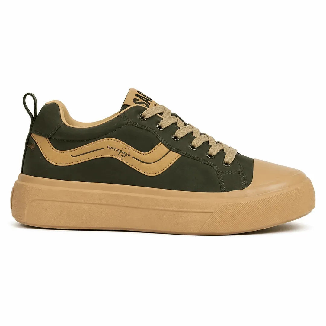 A low-top platform sneaker in dark olive green and tan, featuring a thick tan platform sole, tan laces, and a tan side stripe on a white background.