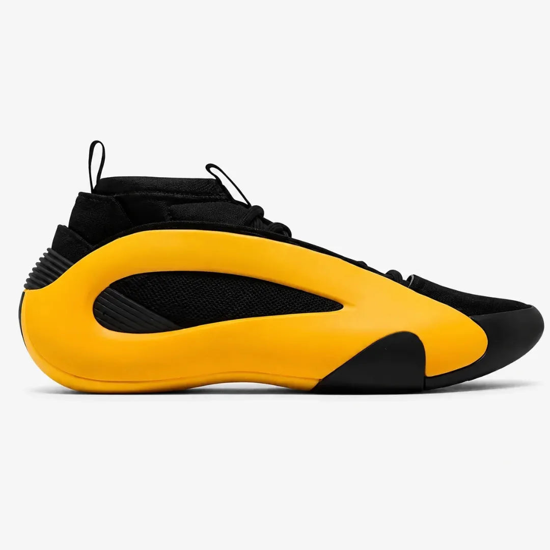 A high-top athletic sneaker in black and bright yellow, shown from a side profile view against a light gray background.