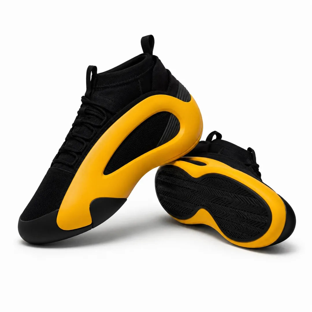 A pair of black and bright yellow high-top sneakers, with one shoe standing upright and the other lying on its side to show the sole, set against a plain white background.