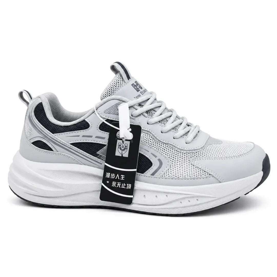 A light gray and white athletic sneaker with black accents, featuring a thick white midsole, mesh upper, and a black hangtag with Chinese text.