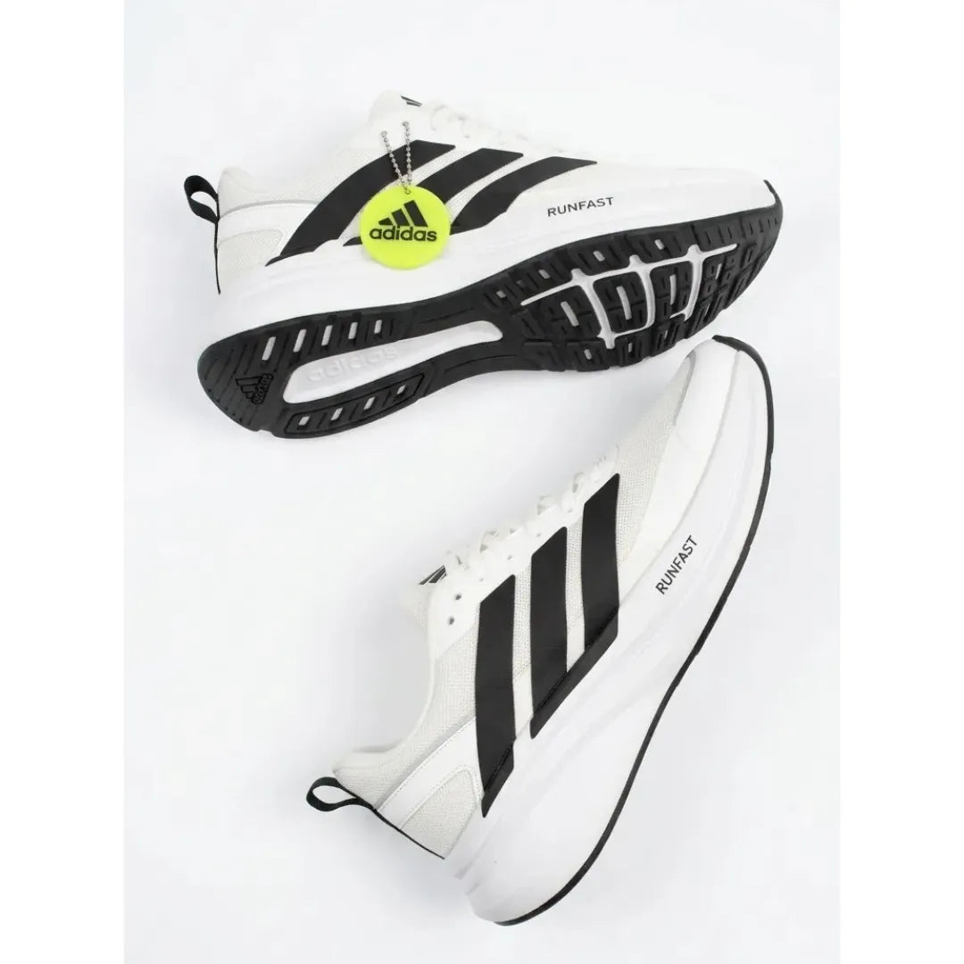 A pair of Adidas Runfast sneakers in white and black, showing both the side profile and the sole of the shoes against a plain white background.