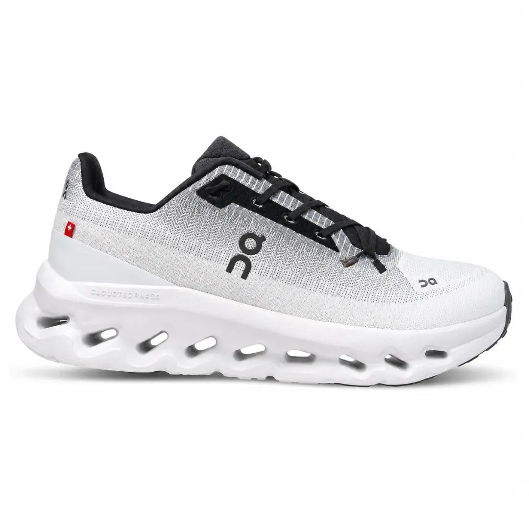 A pair of dark brown knit slip-on sneakers with white cushioned soles and a gum outsole, shown on a plain white background.