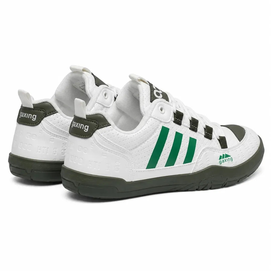 A pair of white low-top athletic sneakers with dark olive green accents, featuring three green stripes on the side, a green heel tab, and a green outsole.