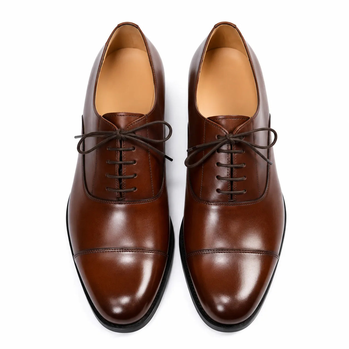Brown leather formal Oxford shoe with black sole