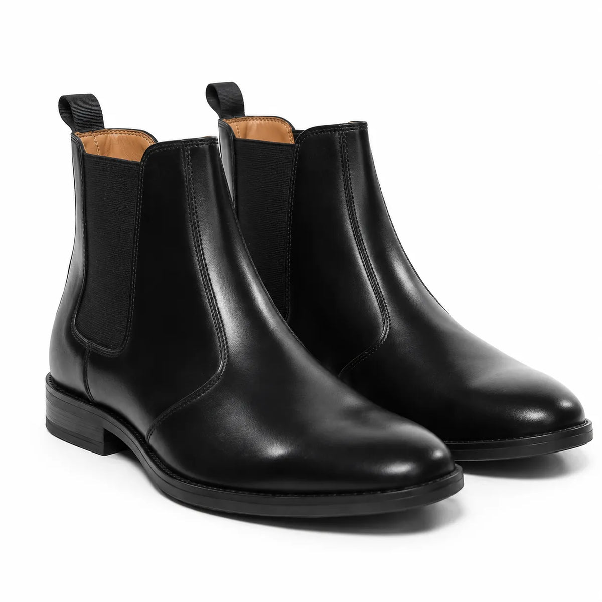 A pair of black leather Chelsea boots with black elastic side panel
