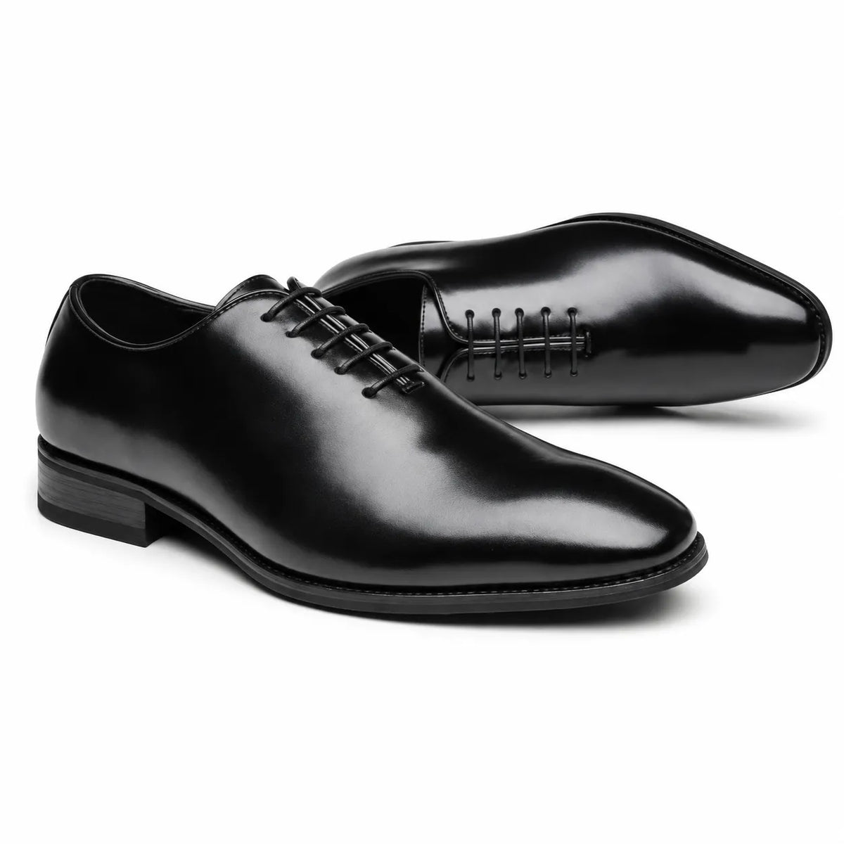 A pair of men's black leather shoes