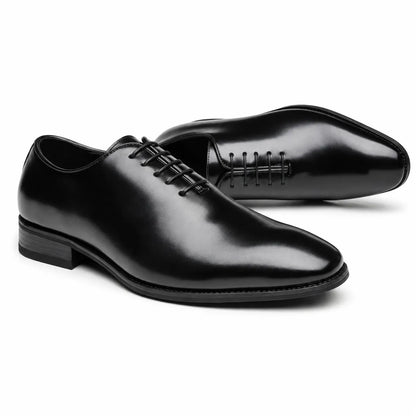 A pair of men's black leather shoes