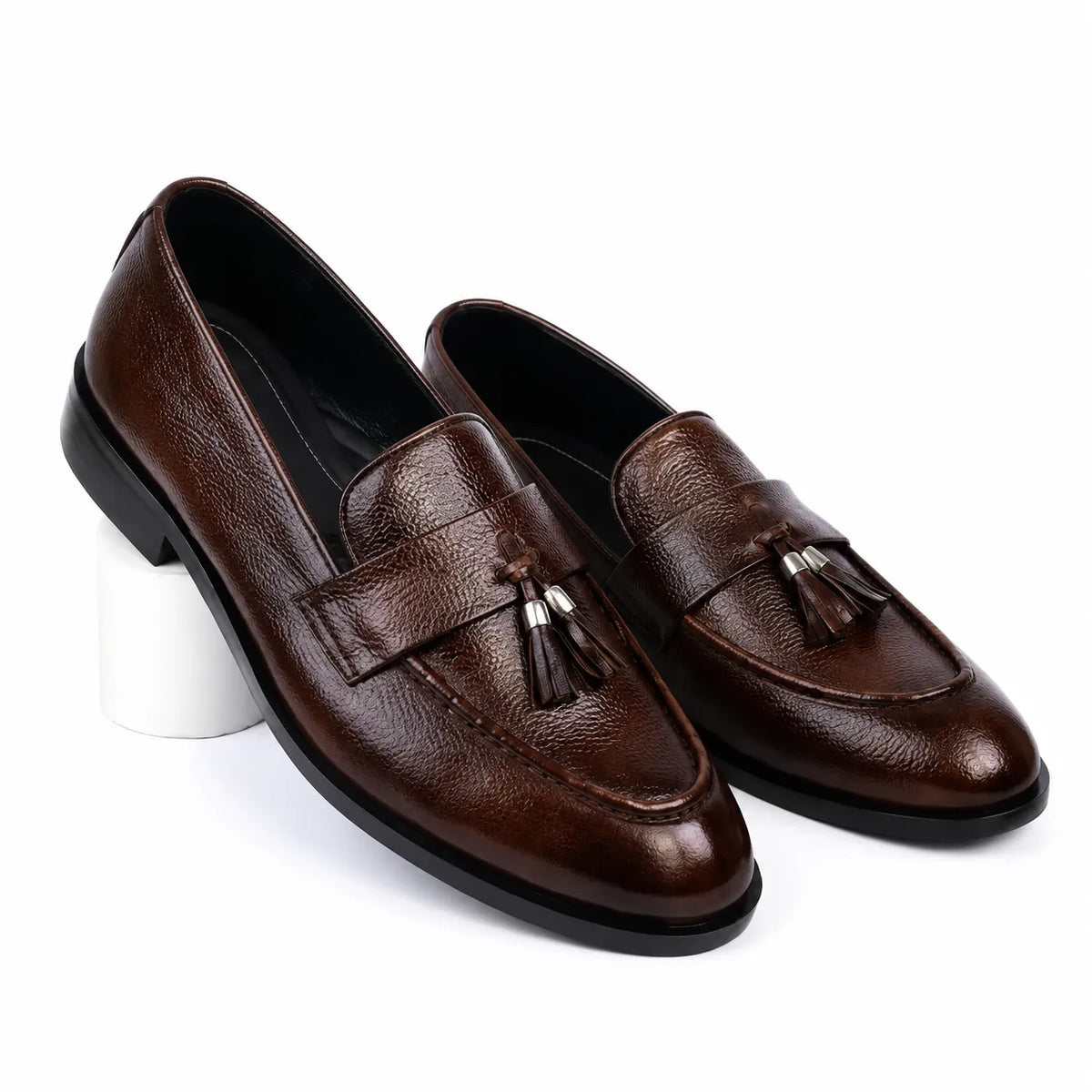 Premium men's brown leather tassel loafers with textured finish