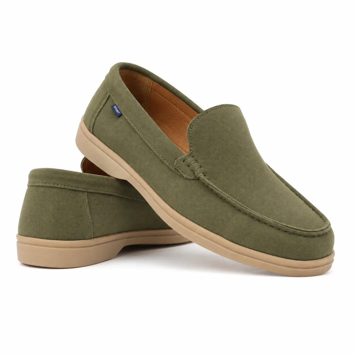 Stylish olive green suede loafers for everyday wear isolated 