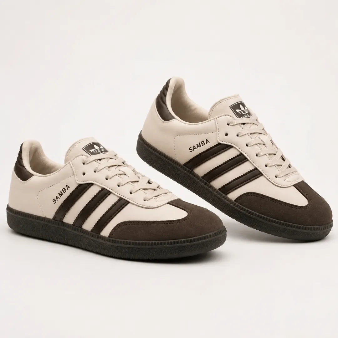 A pair of light gray and white athletic sneakers with black accents, featuring a chunky sole, mesh panels, and a black hanging tag with Chinese text.