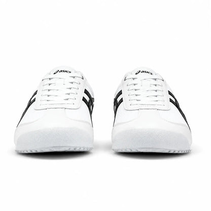 A pair of white Asics sneakers shown from the front on a clean white background.