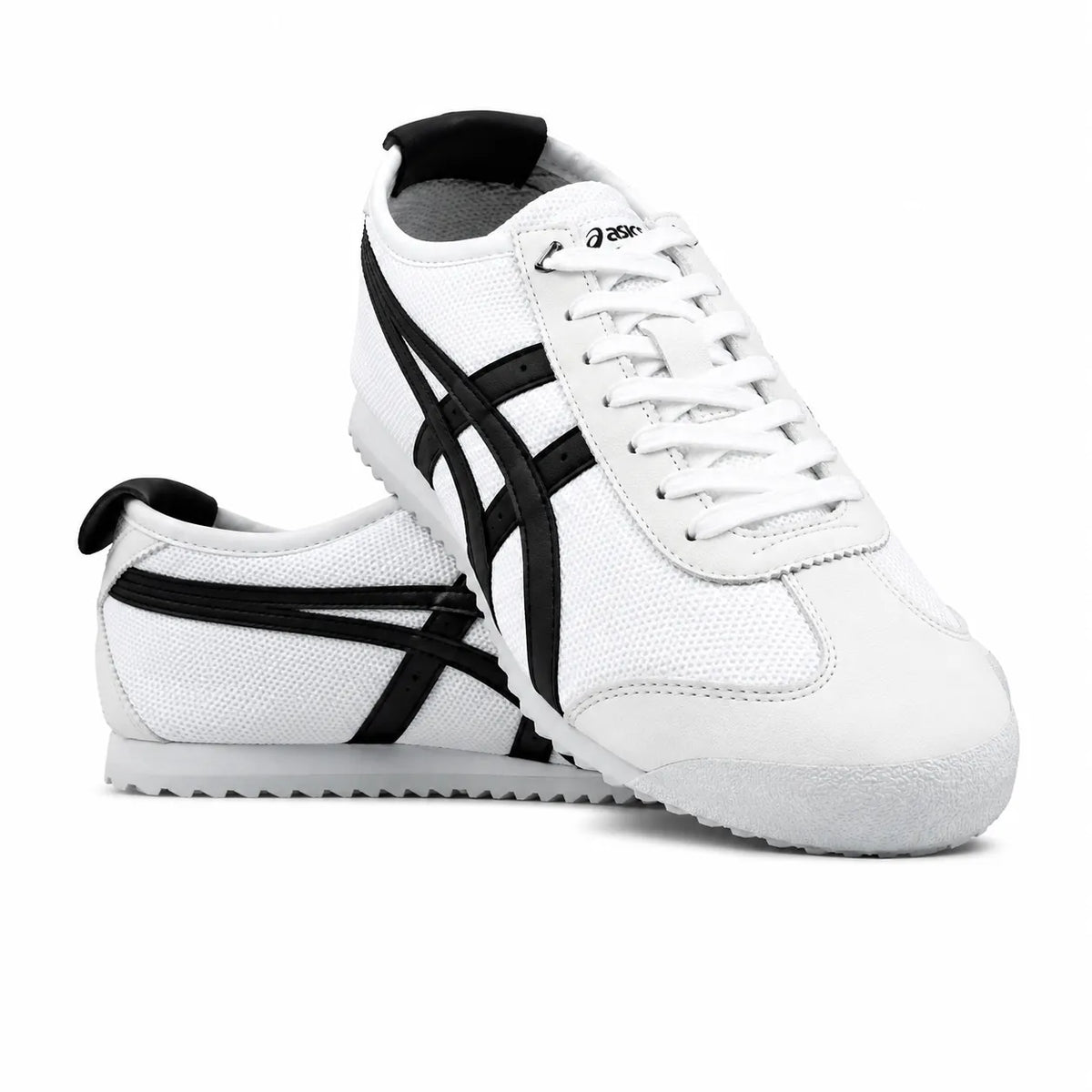 A pair of white Asics sneakers with black side stripes, shown on a clean white background.