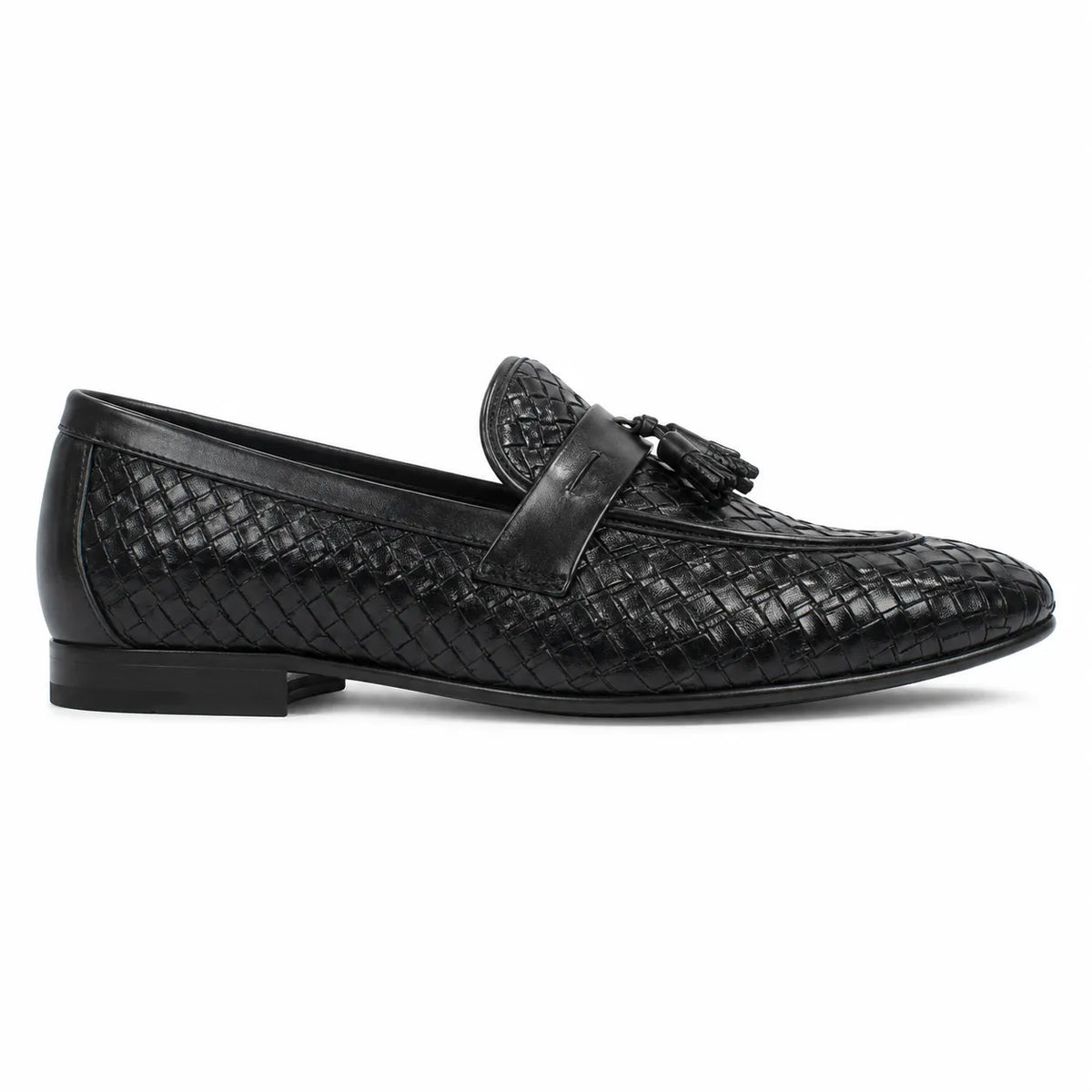 A single black woven leather loafer with a tassel strap