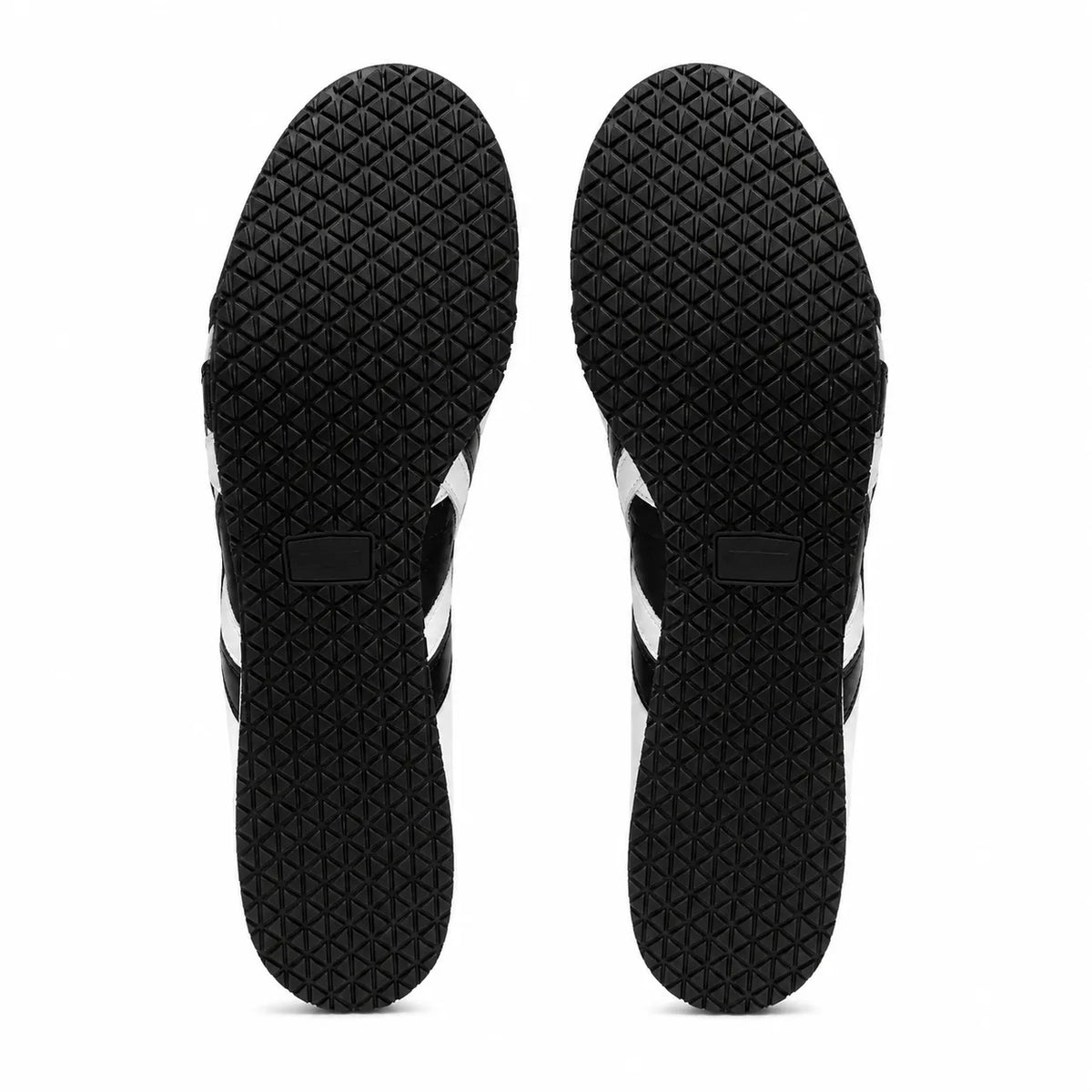 Black and white sneakers shown from the sole view, displaying a textured black tread pattern with white side stripes on a white background.